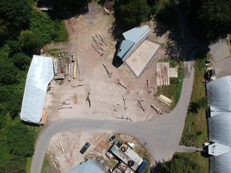 Woodland Cabin ConstructionYardDrone2 WyattArmstrong