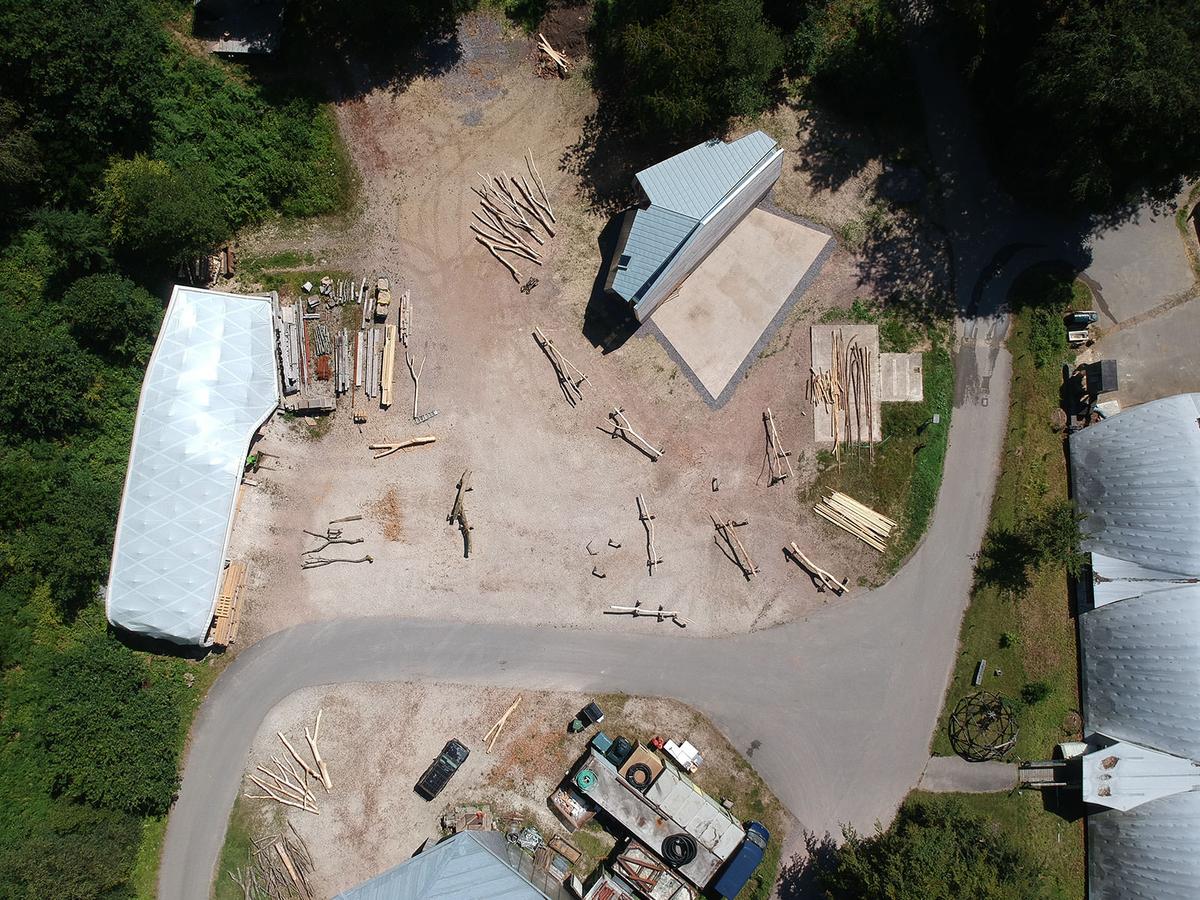 Woodland Cabin ConstructionYardDrone2 WyattArmstrong